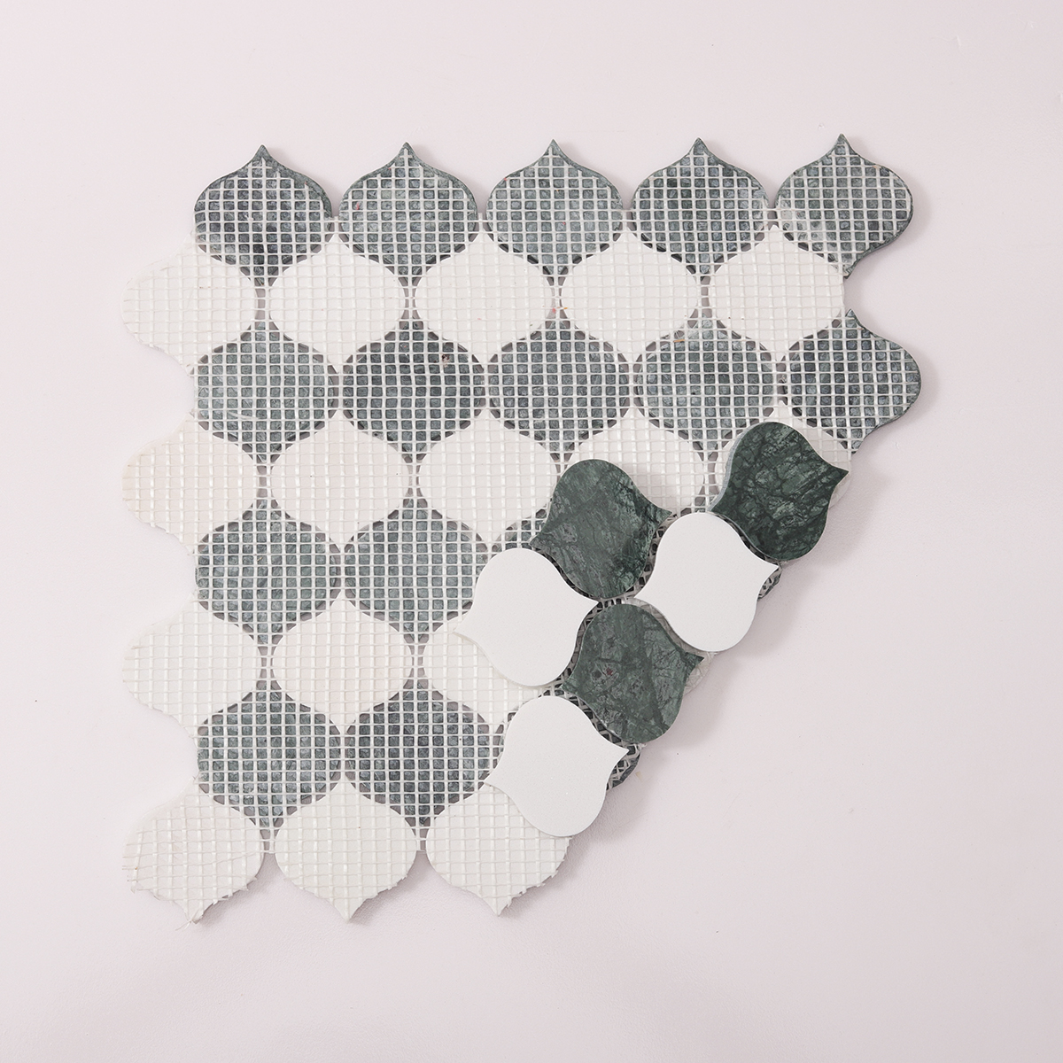 Back side of Green and White Arabesque Lantern Marble Mosaic Tiles, folded.