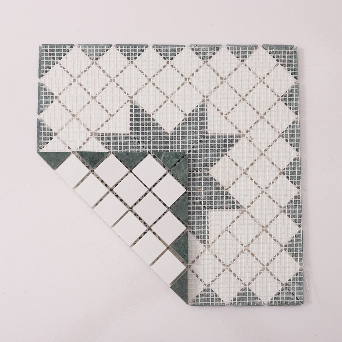 Folded back side of Green & Snow White Multi-Finish Star Marble Mosaic Tiles