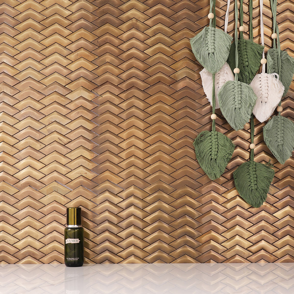 Chevron Brass Metal Mosaic Wall Tile on the wall, paired with white floor tiles, modern and stylish