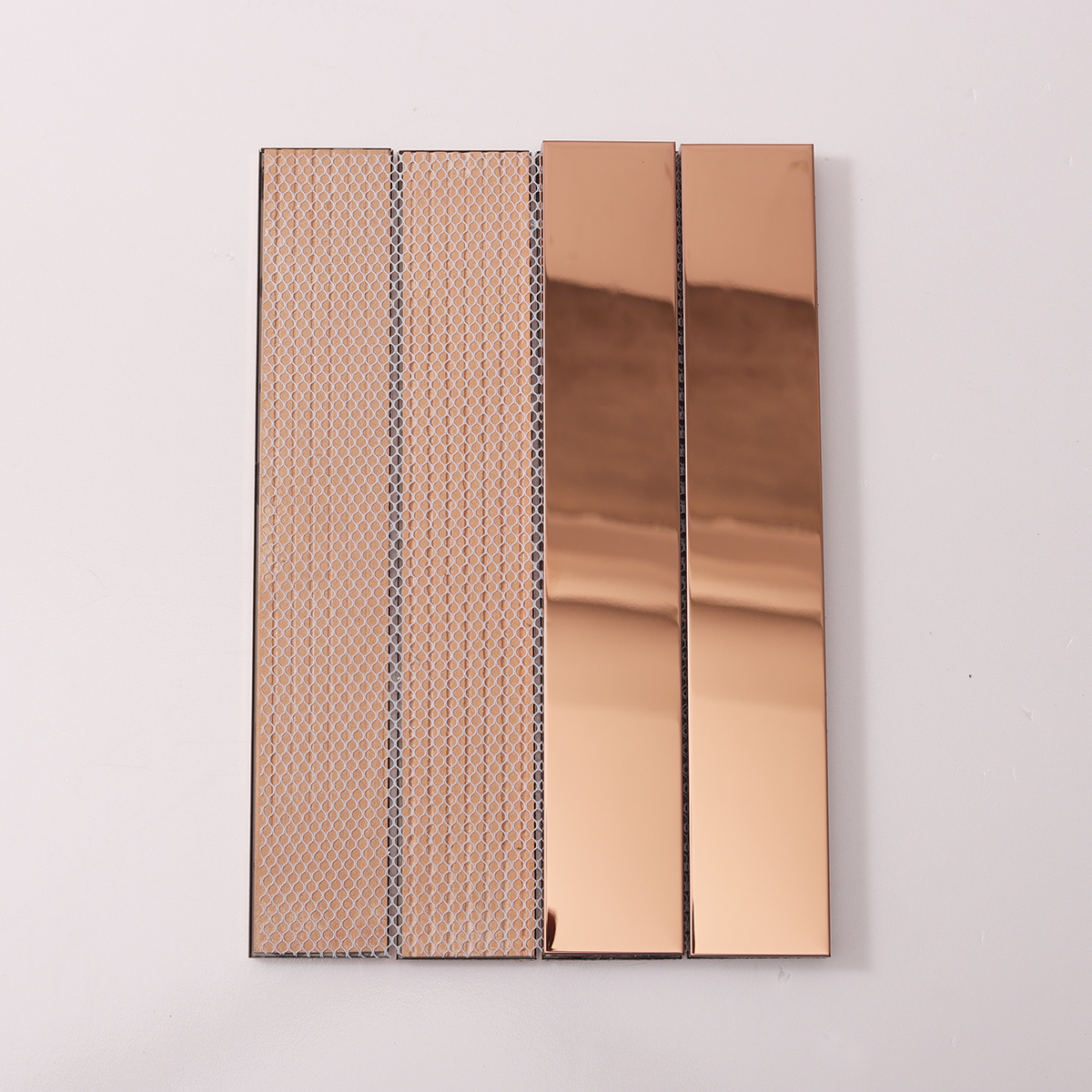 Metal Rose Gold Glossy Stacked Mosaic Tile, back side with fold visible