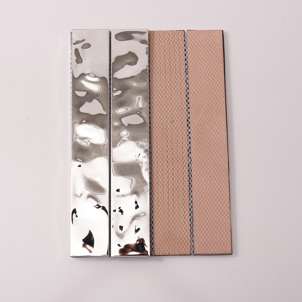 Silver Stainless Steel Stacked Mosaic Tiles, back side with fold visible