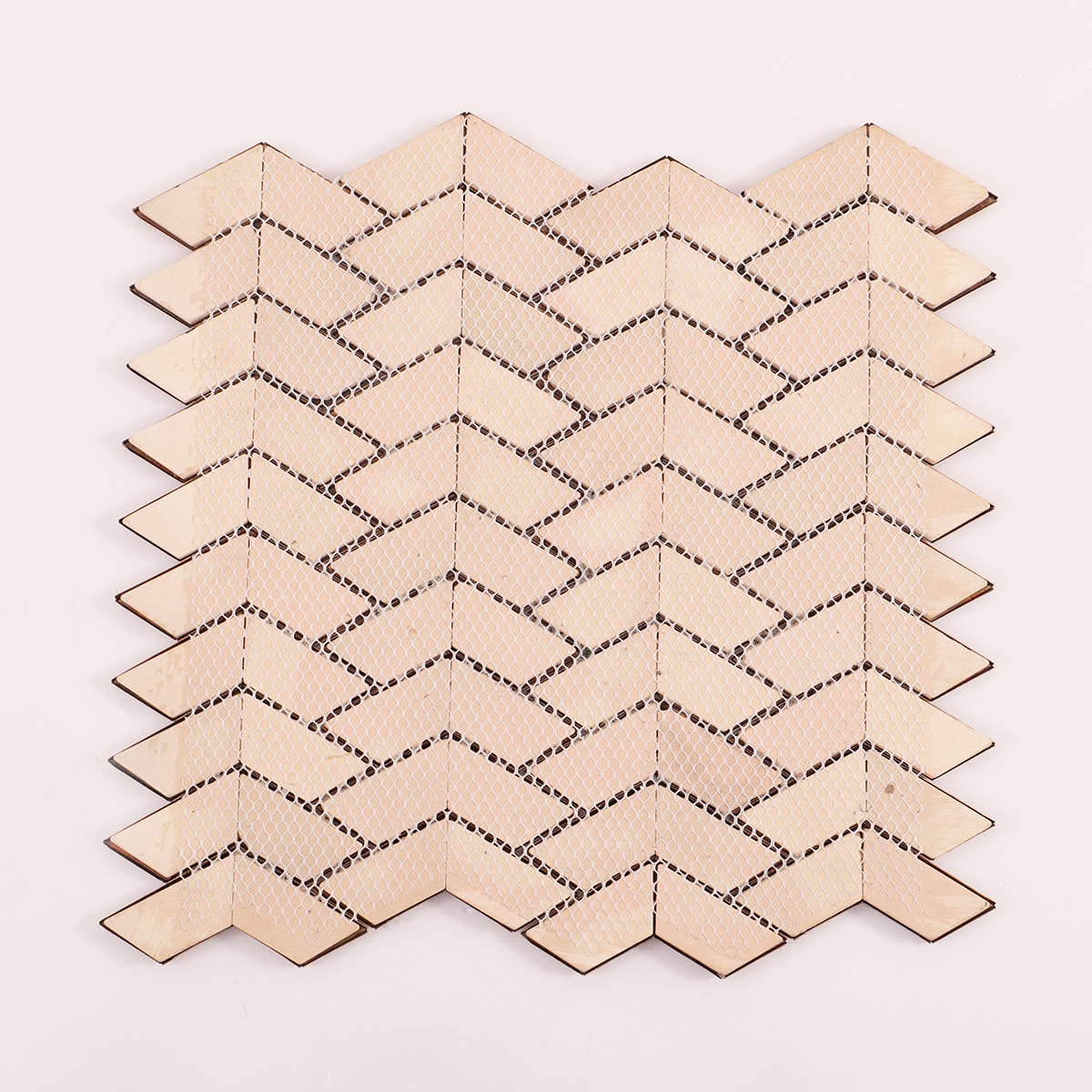Backside of Herringbone Copper 3D Wave Metal Mosaic Tile with Mesh Backing