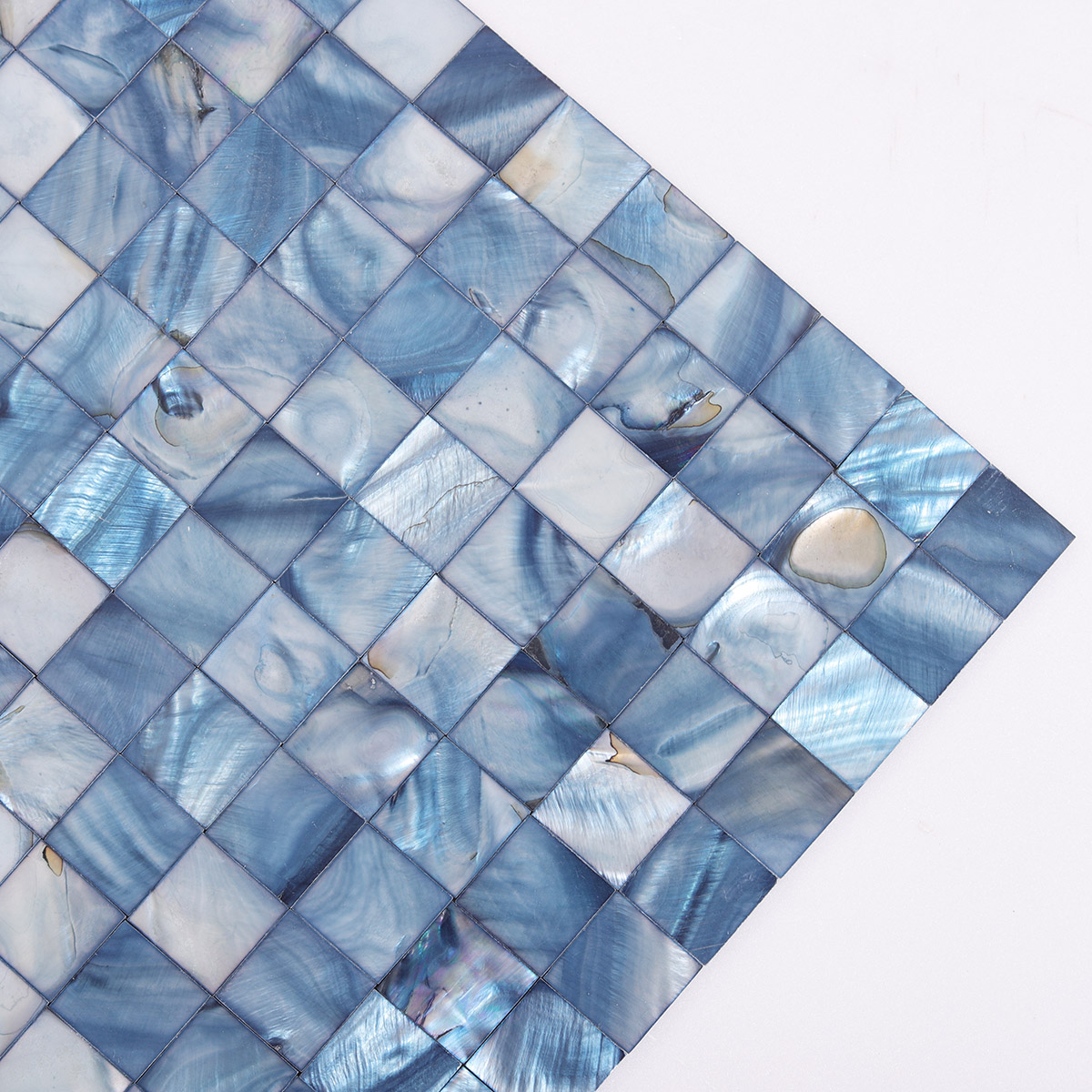 Close-up of Iridescent Blue Mother of Pearl Square Mosaic Tile Surface