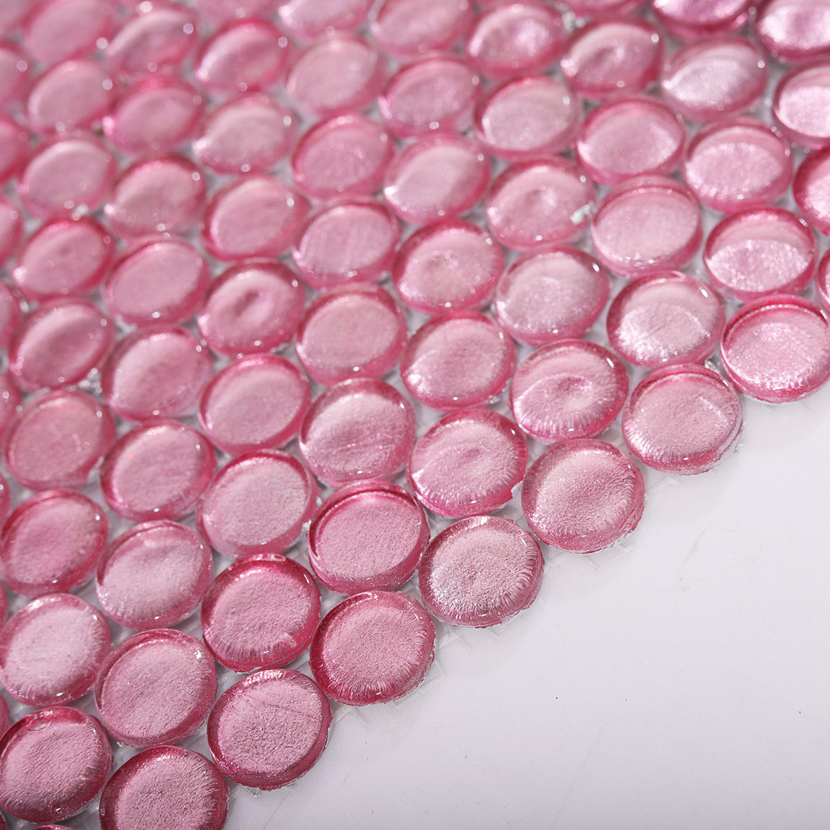 Side View Showing Thickness of Glossy Pink Penny Round Mosaic Tile