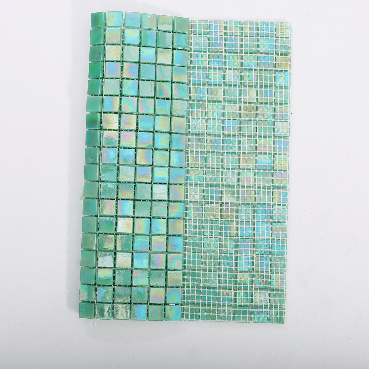 Backside of Iridescent Turquoise Glass Square Mosaic Tile with Mesh Backing