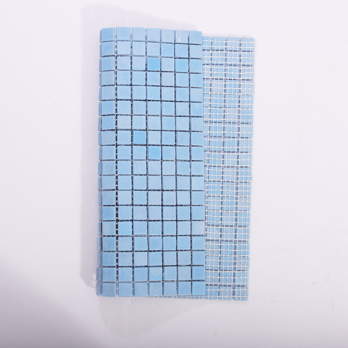Backside of Sky Blue Glass Mosaic Tile with Mesh Backing