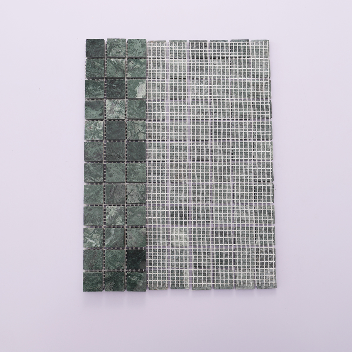 Green marble square mosaic tiles with mesh backing, folded for easy installation