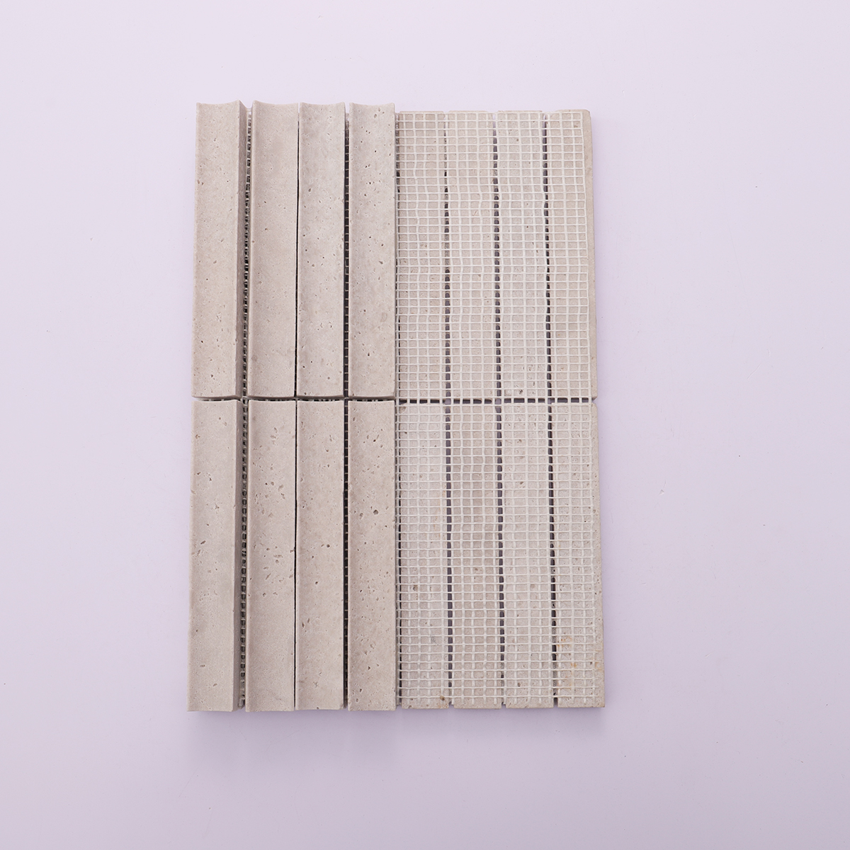 Back view of the gray travertine stone mosaic tile with mesh backing