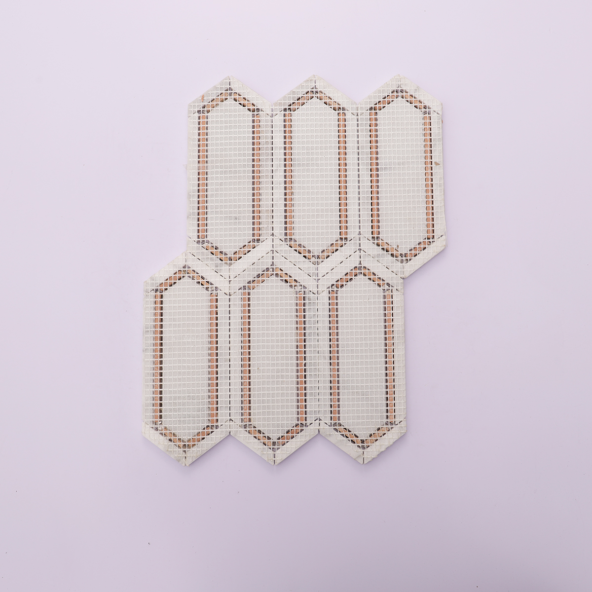 Back view with mesh backing of Carrara white and gold metal picket marble mosaic tiles.