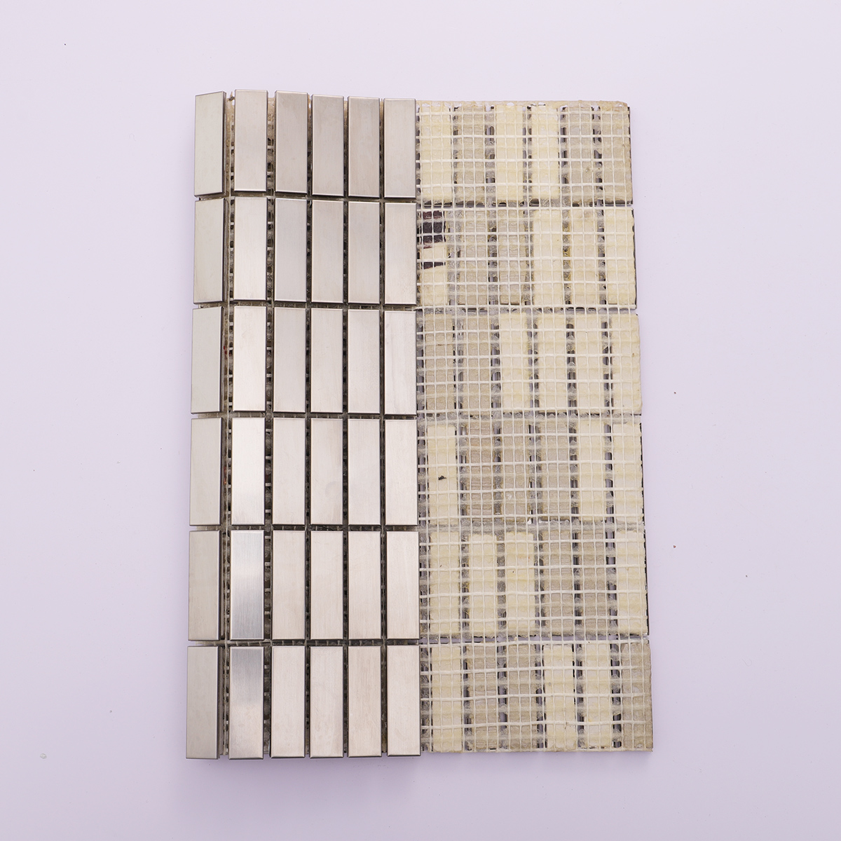 Back view of brushed stainless steel rectangle tiles