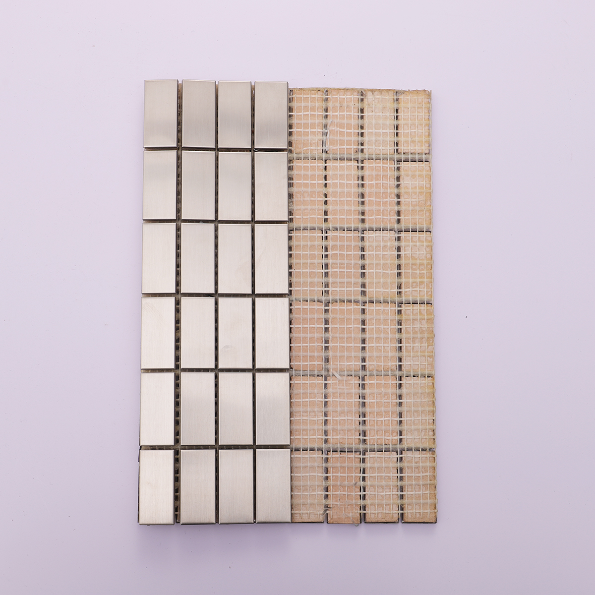 Rear view of the brushed silver mosaic tiles, showing structured backing