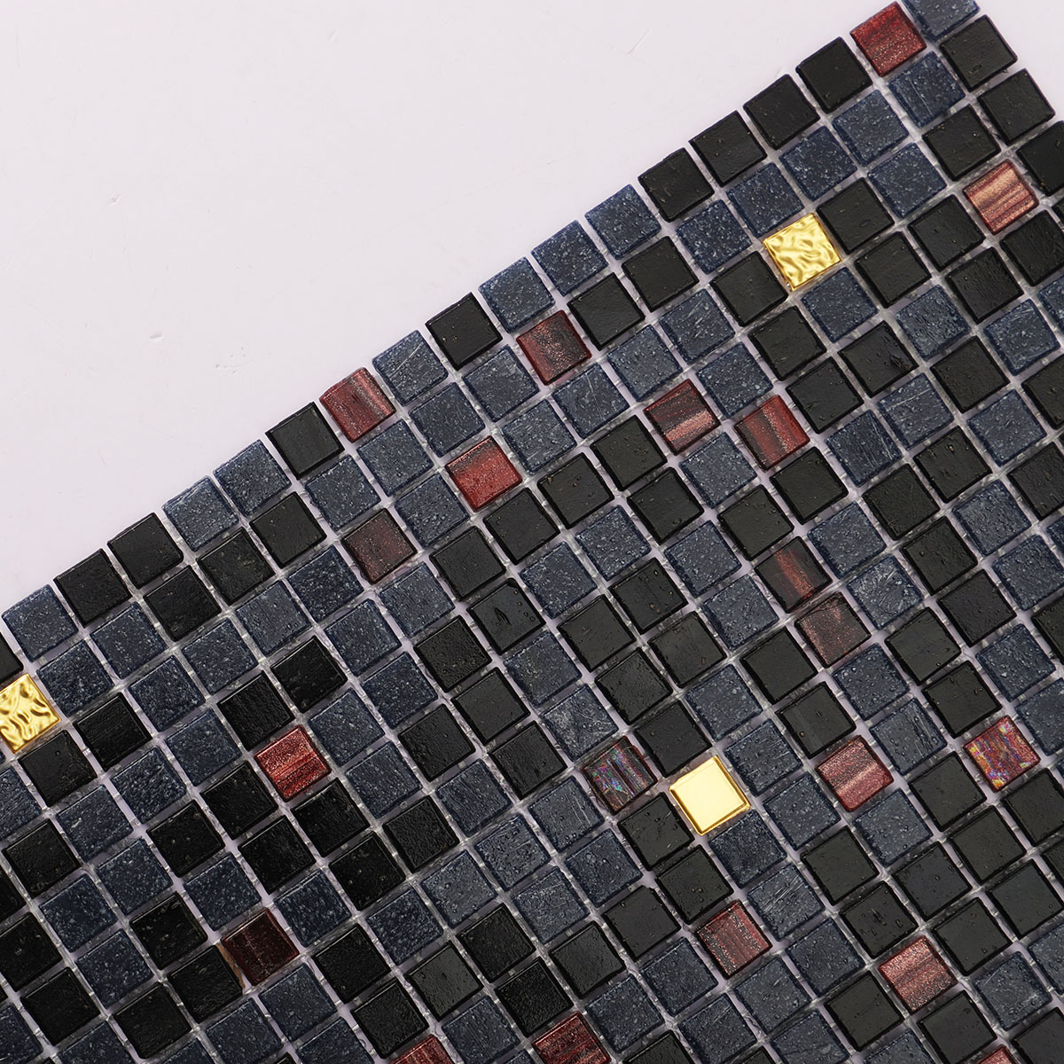 Close-up view of black mixed glass micro mosaic tiles with gold.