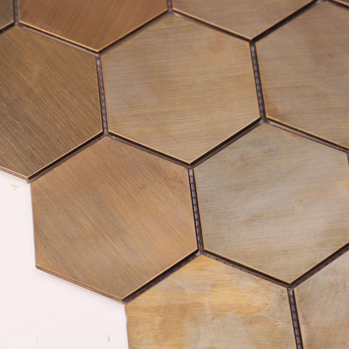 Close-up of copper hexagon mosaic wall tile