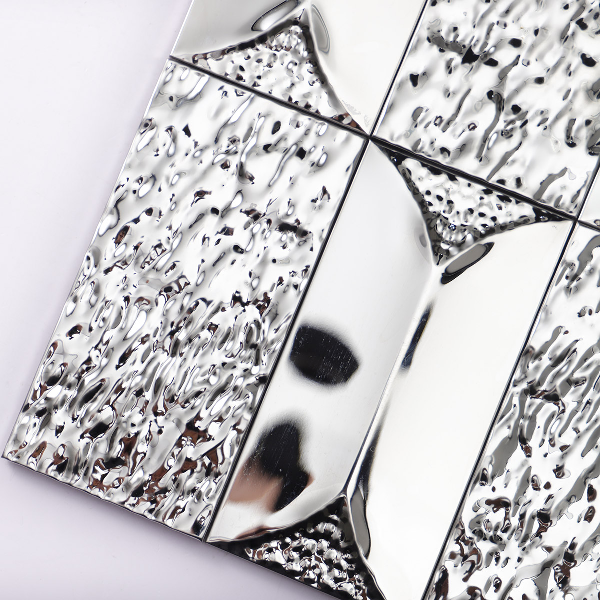 Close-up of 3D stainless silver rectangle mosaic tiles