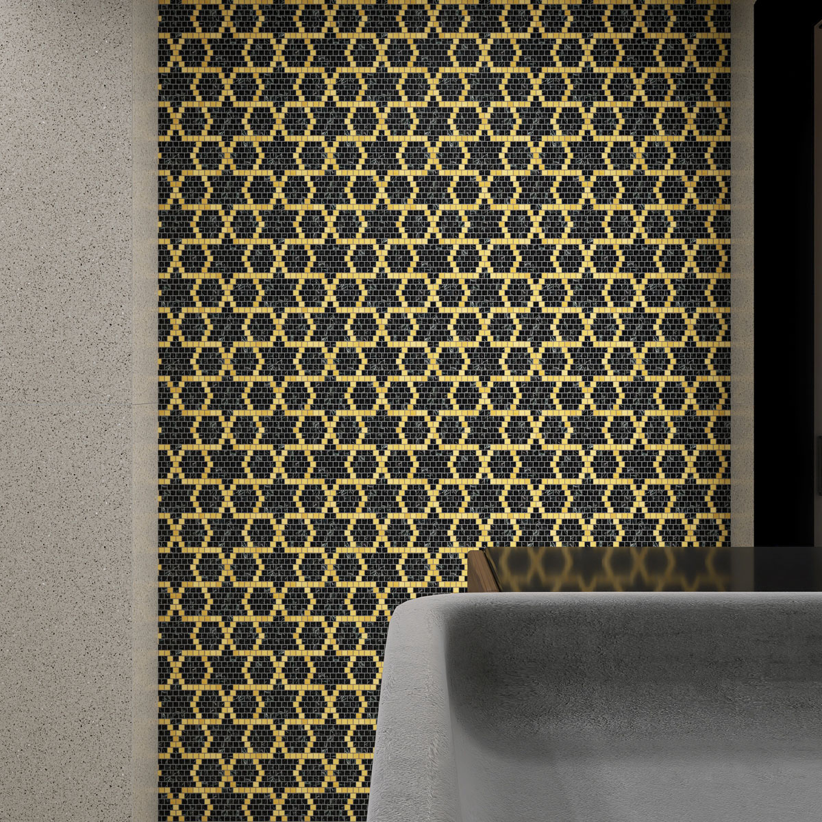 Wall with green marble and metal pixel art mosaic, featuring a gray sofa.