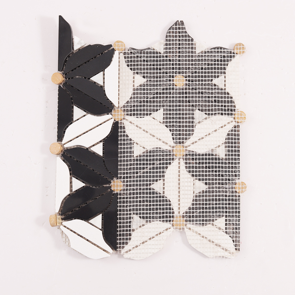 Back side of black and white flower marble mosaic tiles, folded