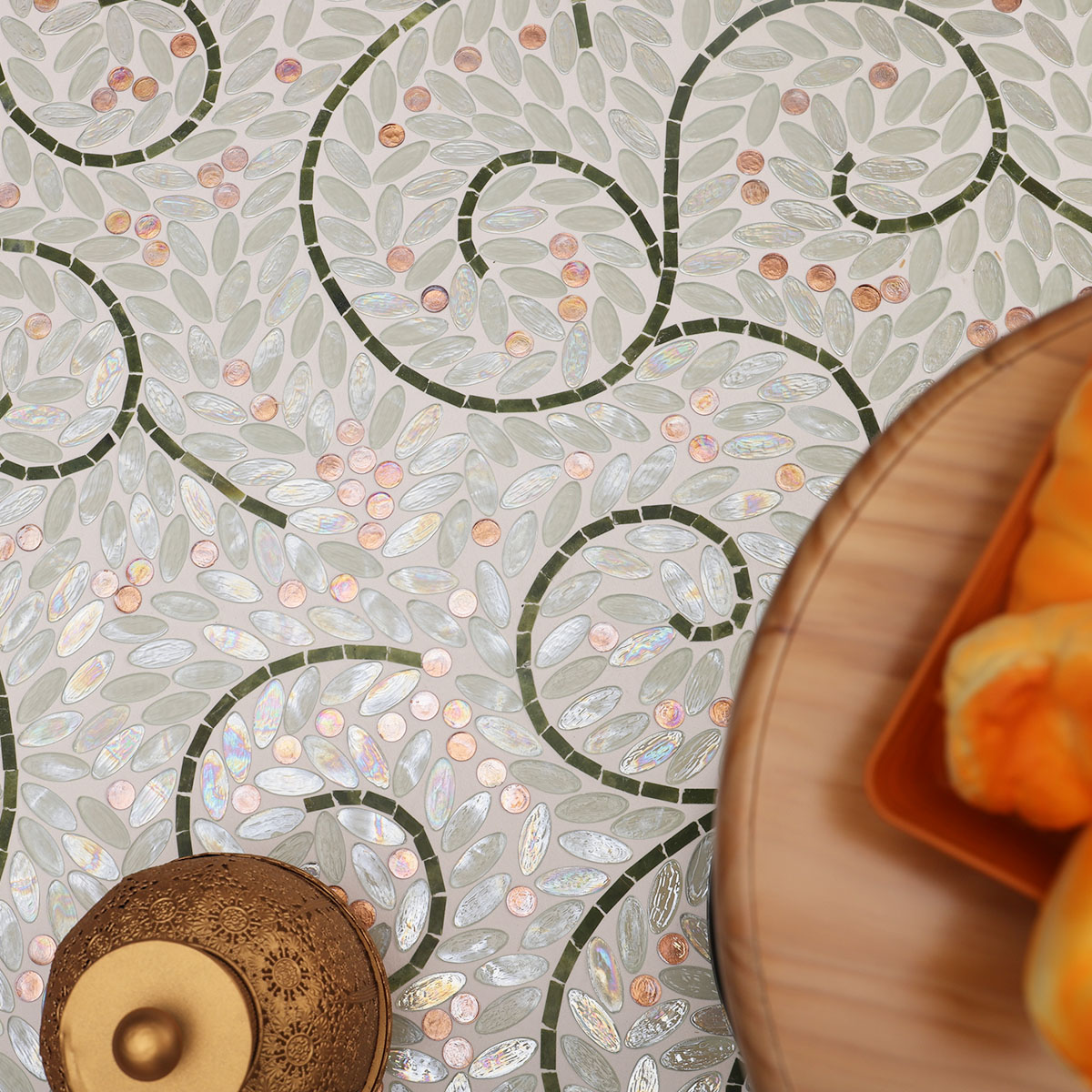 White Oval Glass Mosaic Art Tiles on the floor, featuring copper accents.