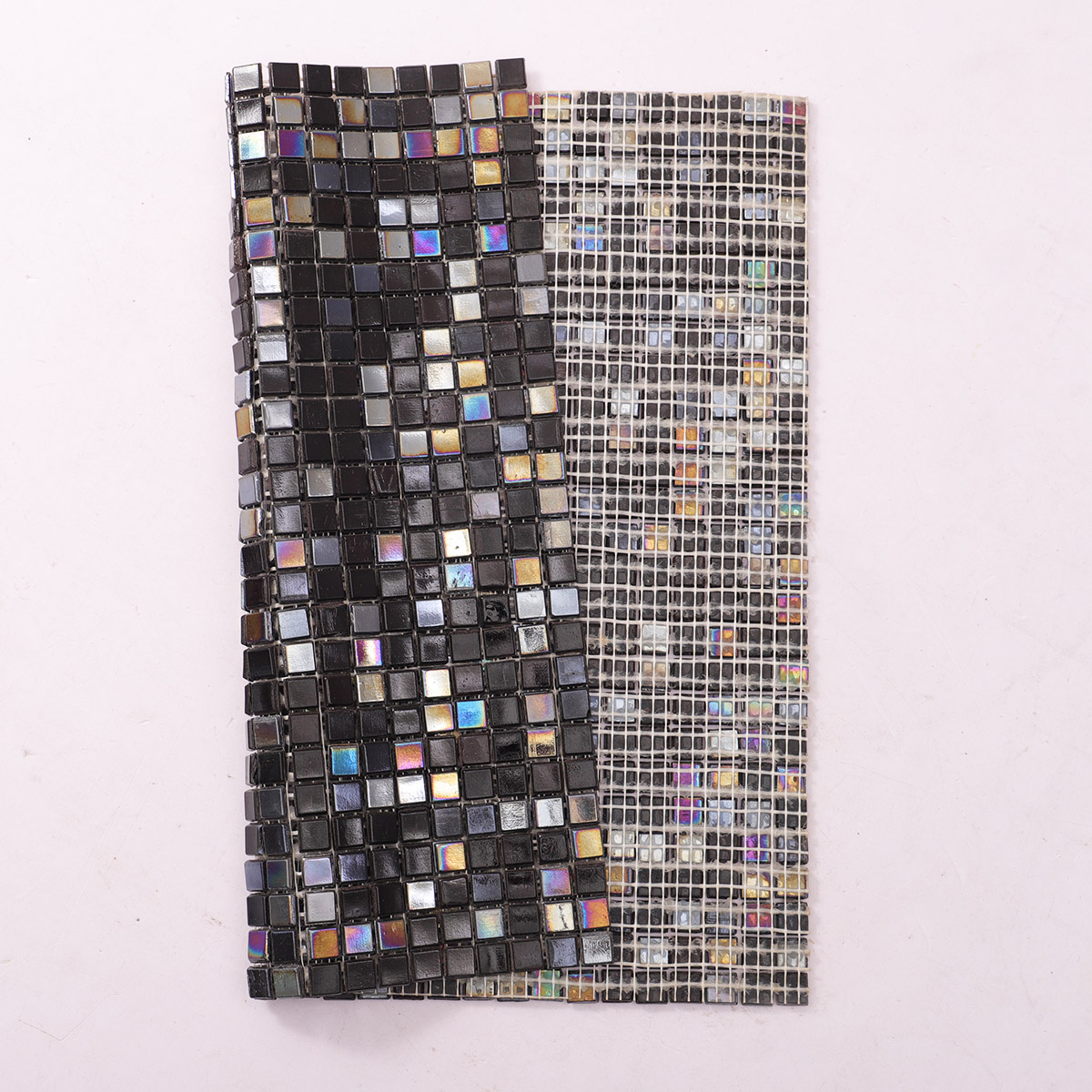 Rear view of Mini Black Square Iridescent Glass Mosaic Tiles, folded 