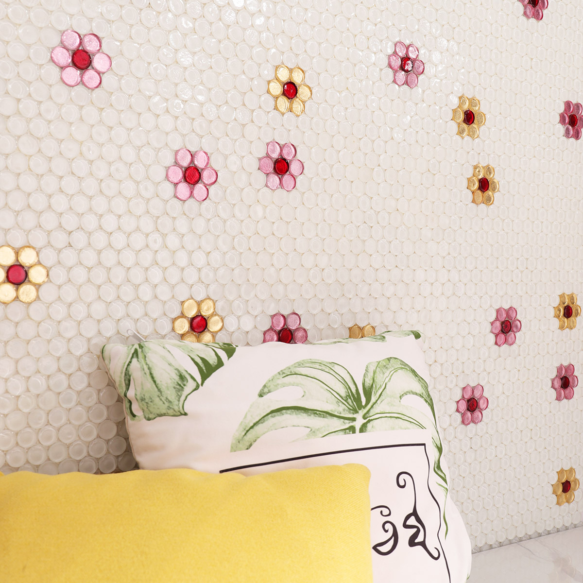 Wall background with floral mosaic tiles installed.