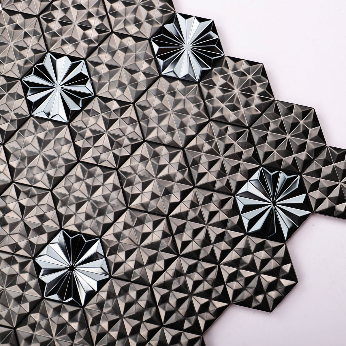 Surface detail close-up of black metal 3D groutless hexagon mosaic tile 