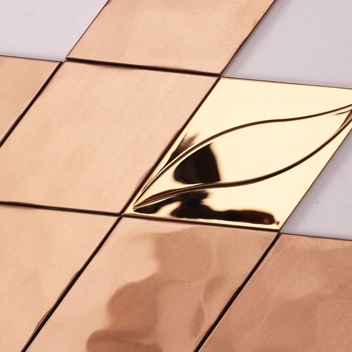 Close-up of rose gold diamond metal mosaic, matte and glossy particle mix