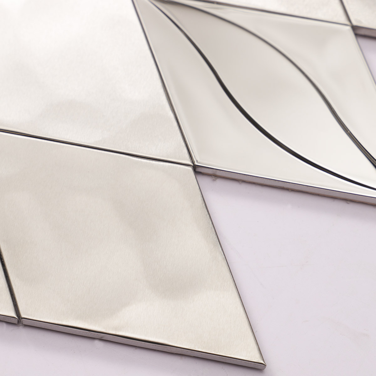 Close-up of particles on mirror silver diamond stainless steel mosaic tiles