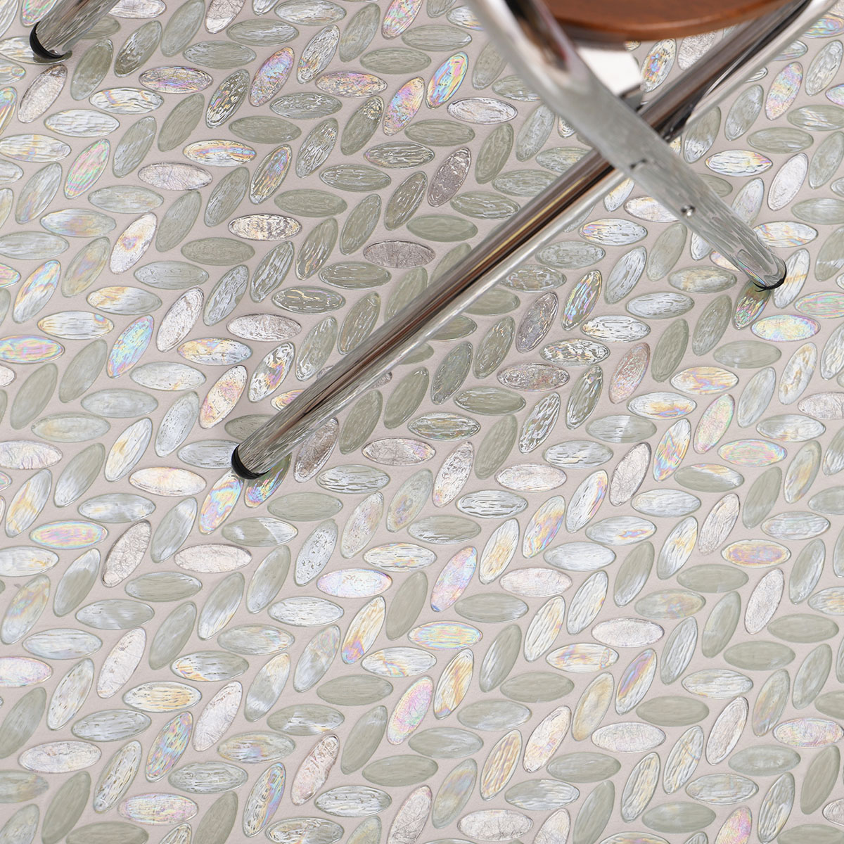 Iridescent White Oval Glass Mosaic Tiles floor setting with a stool