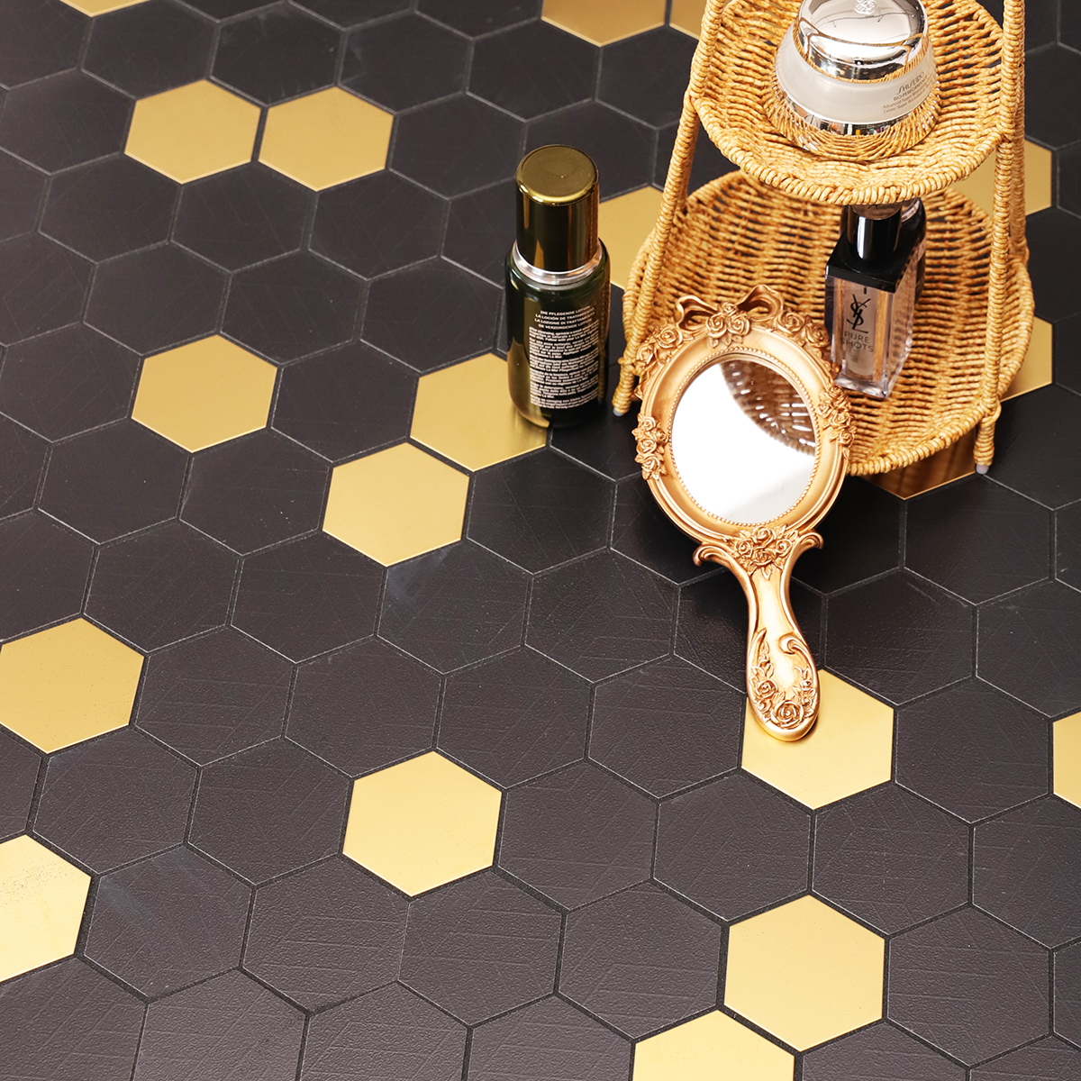 Black and Gold Hexagon Mosaic Tiles, featuring skincare items and a decorative mirror
