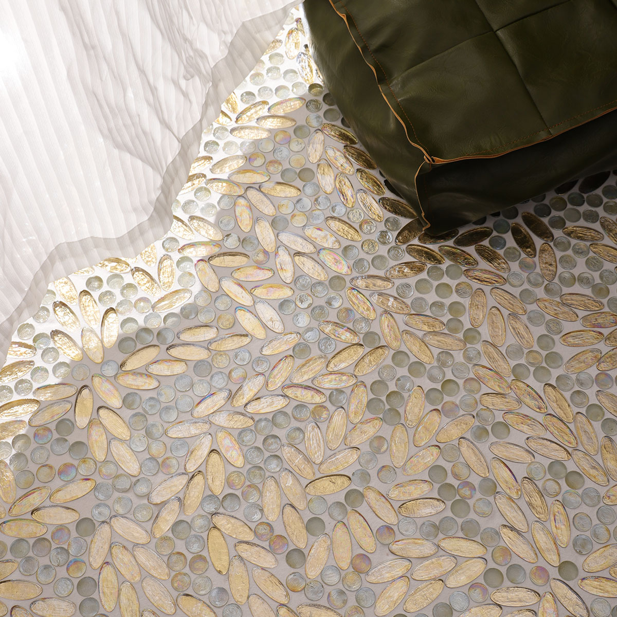 Gold Glass Flower Art Mosaic Floor Tiles with white curtains and green leather pillows.