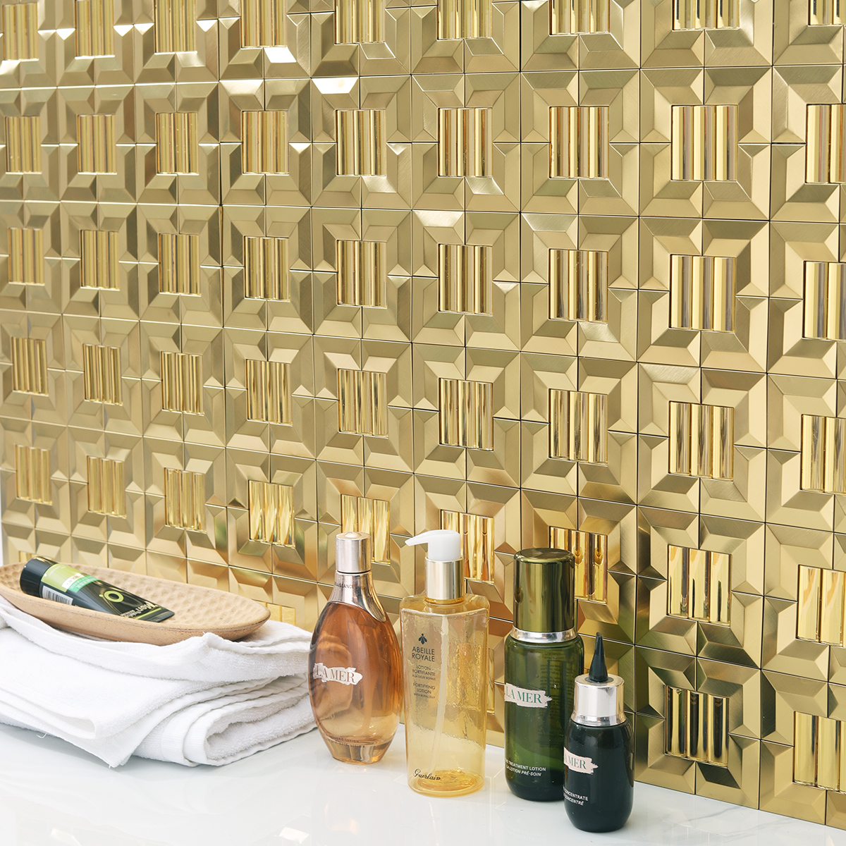  Gold 3D mosaic wall tiles, white tiles on the floor, skincare products neatly arranged