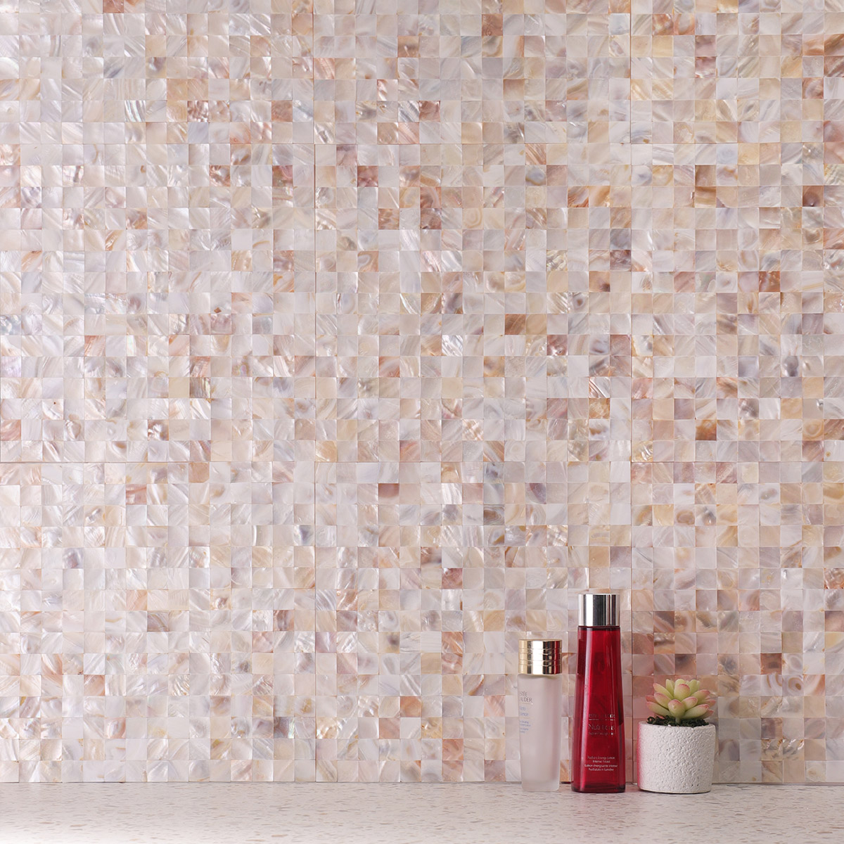 Natural mother of pearl mosaic tile on the wall.