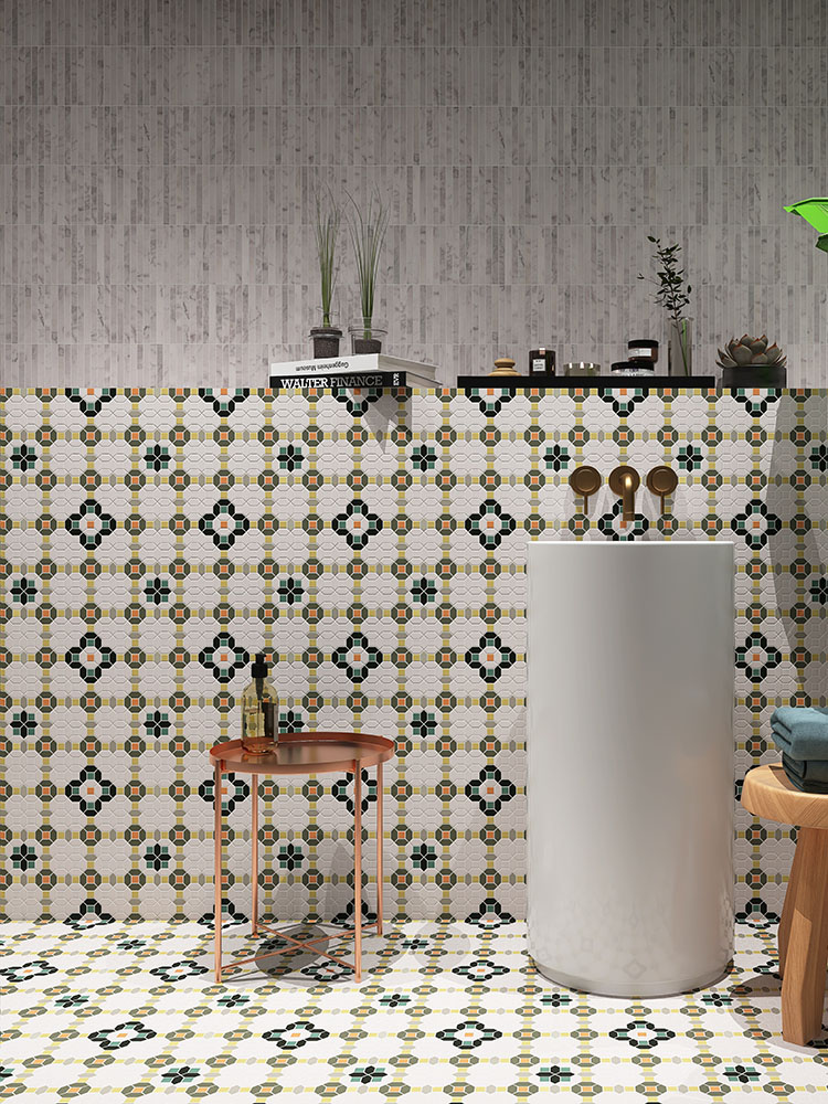 Green mosaic tiles with continuous patterns for both wall and floor applications.