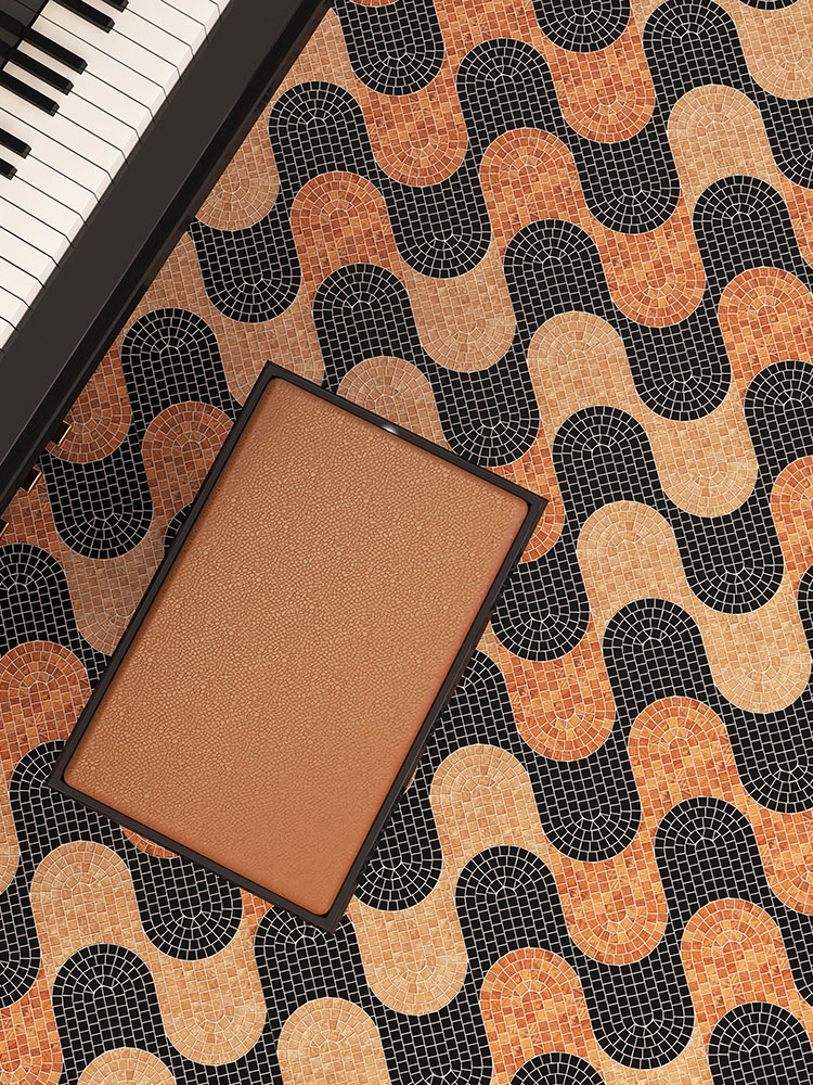 Black and brown marble mosaic tiles in a wave pattern on the floor.