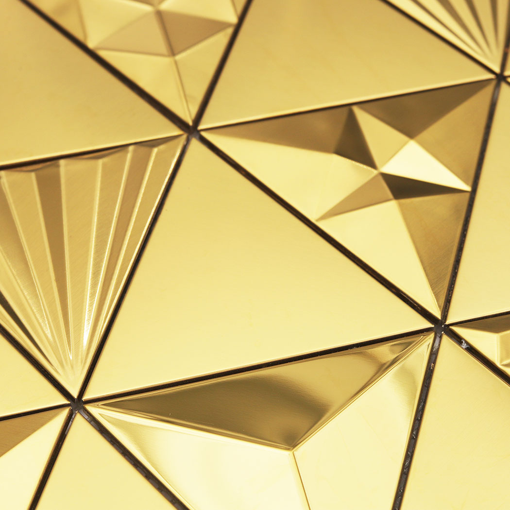 Modern gold triangle mosaic tile texture with dimensional surfaces