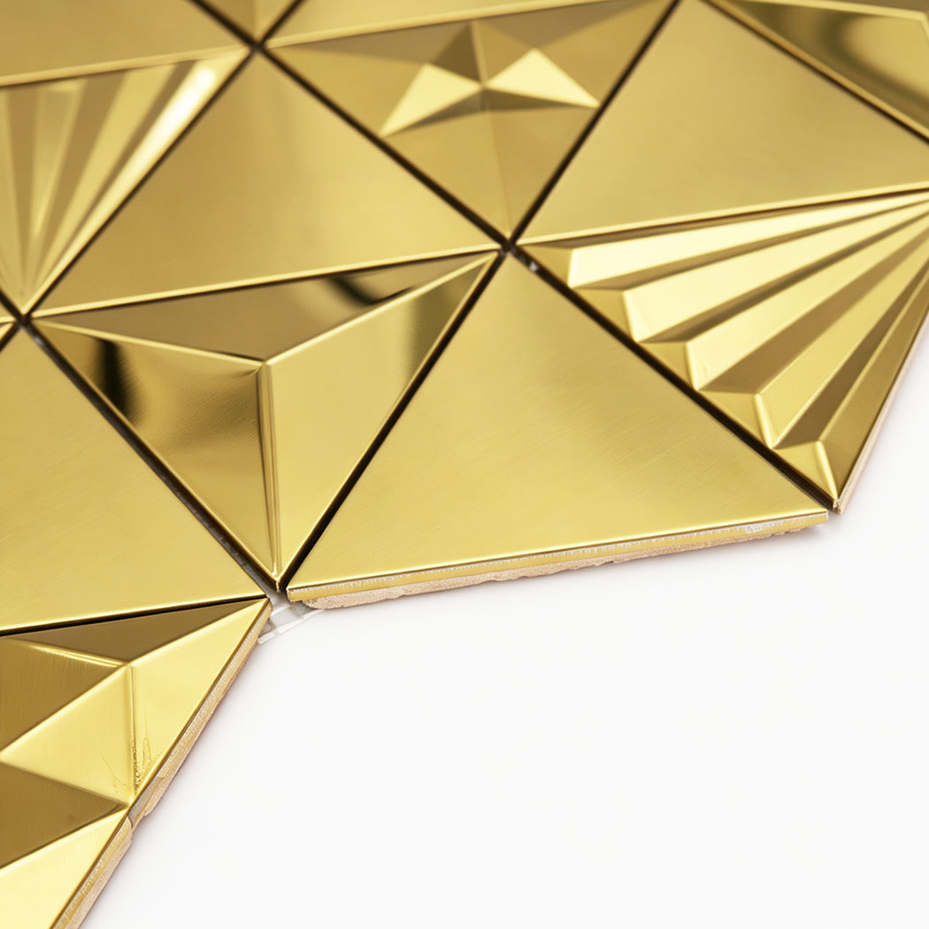 Gold metallic triangle tile edge detail with 3D geometric relief