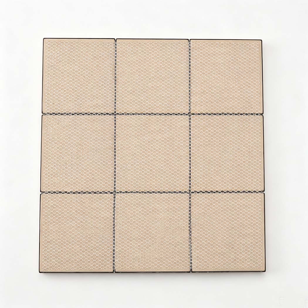 Back view of gold faceted stainless steel mosaic tile sheet with mesh backing