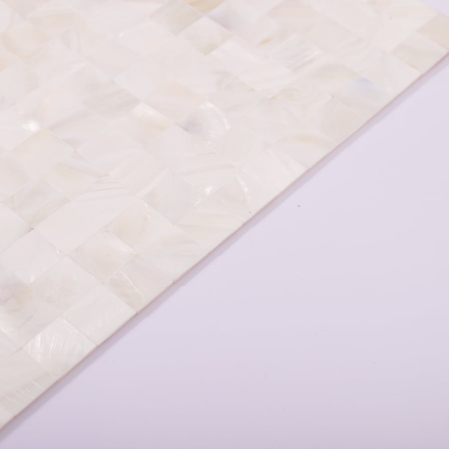 Angled edge view of 20mm shell mosaic showing finish and thickness