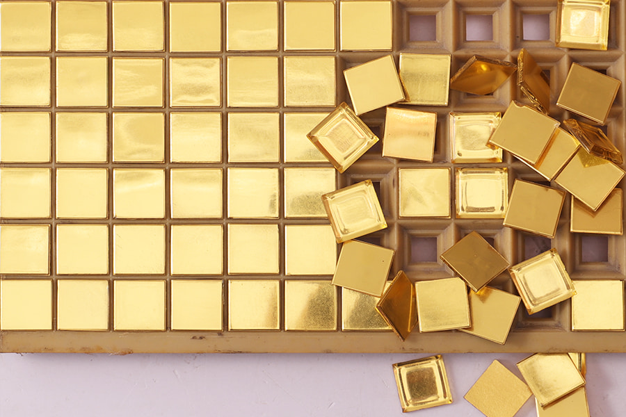 24K gold square glass mosaic tiles arranged in a grid pattern