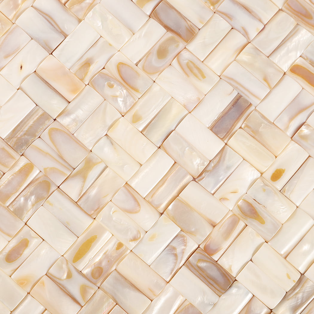 Close-up showing texture of 3D beige mother of pearl basket weave mosaic.