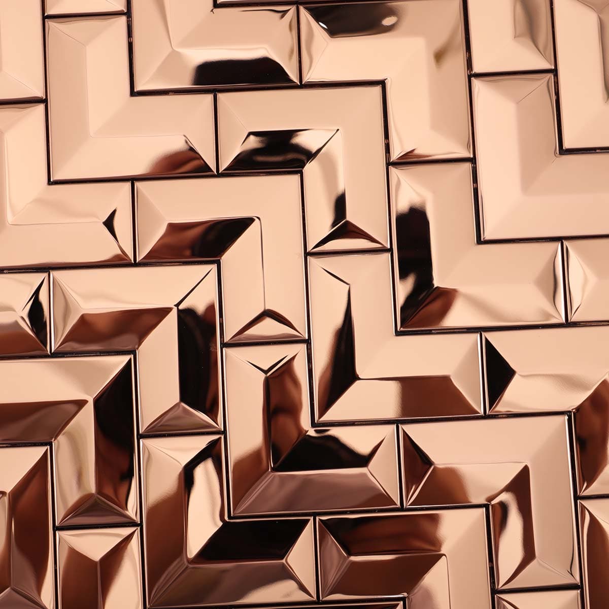 Detailed pattern of glossy 3D rose gold stainless steel chevron tile