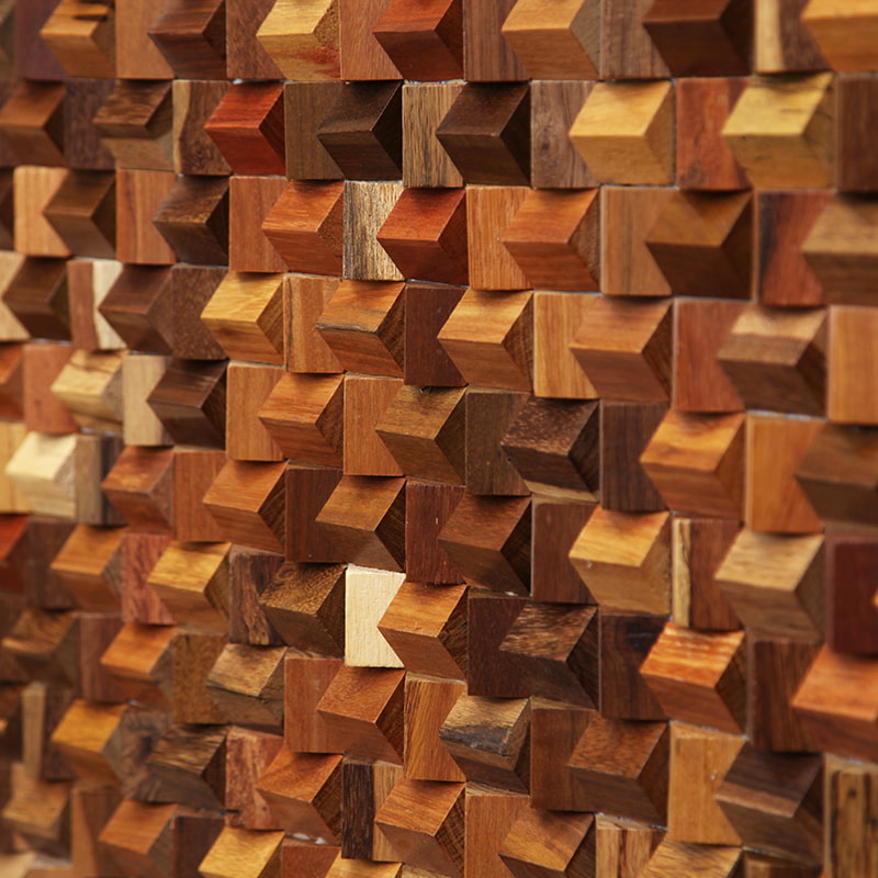 Front view of 3D wood mosaic panel with varied cube relief textures