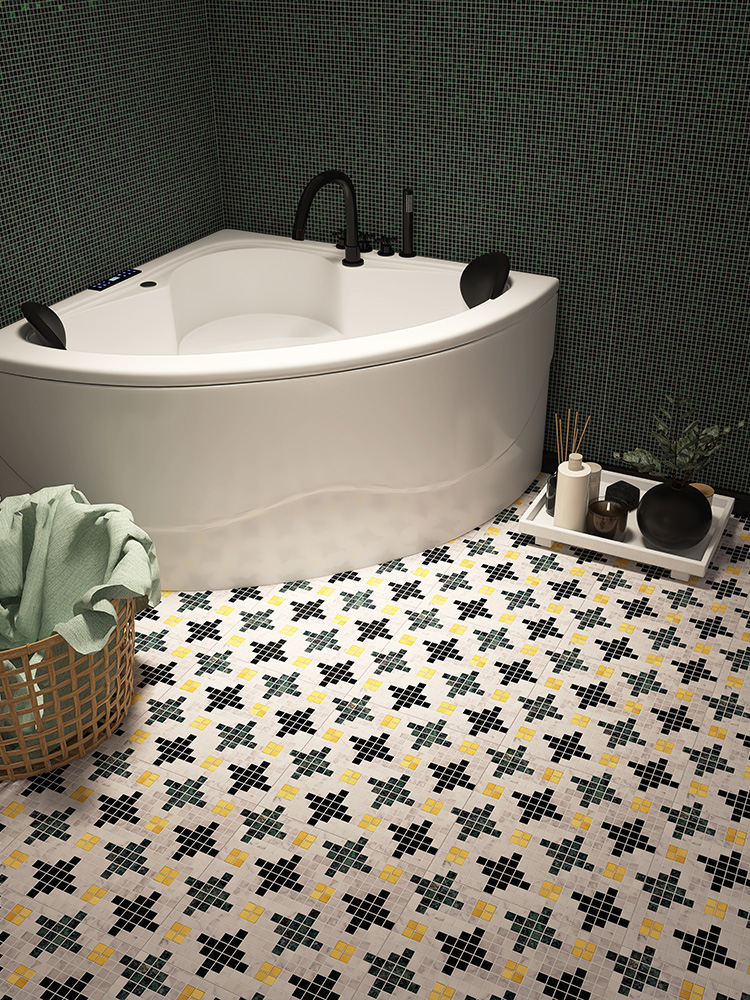 Stone mosaic floor in a bathroom with a bathtub and bath essentials