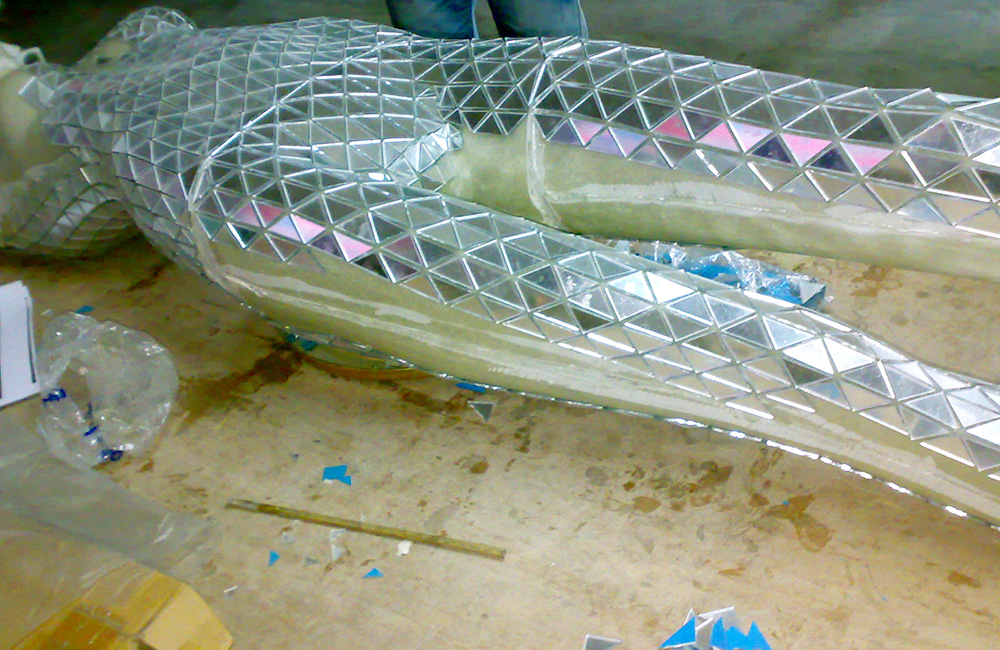 Leg of Mirror Mosaic Mannequin in the process of being made.