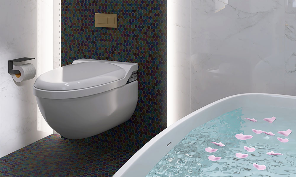 Black iridescent hexagon mosaic tiles on the wall and floor next to a white bath and toilet.