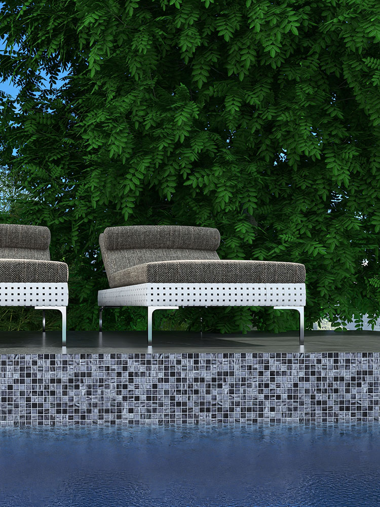 Gray-blue glass mosaic tiles in the pool with stools on the poolside.