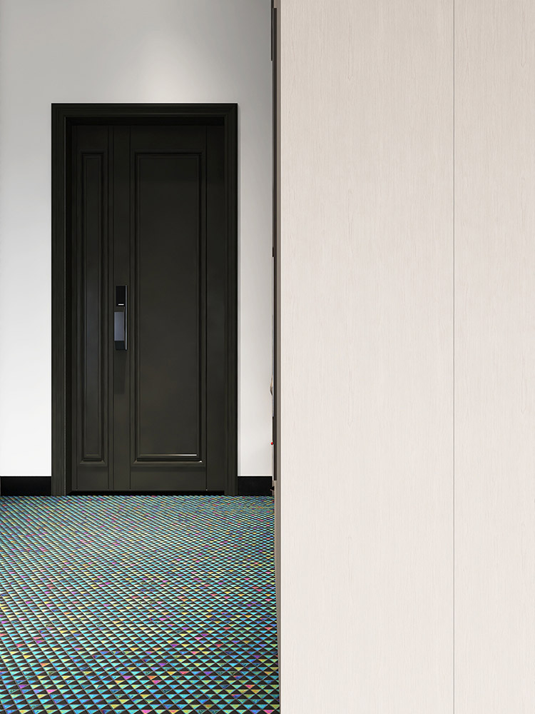 Black and iridescent triangular mosaic tiles in a checkboard pattern on the floor