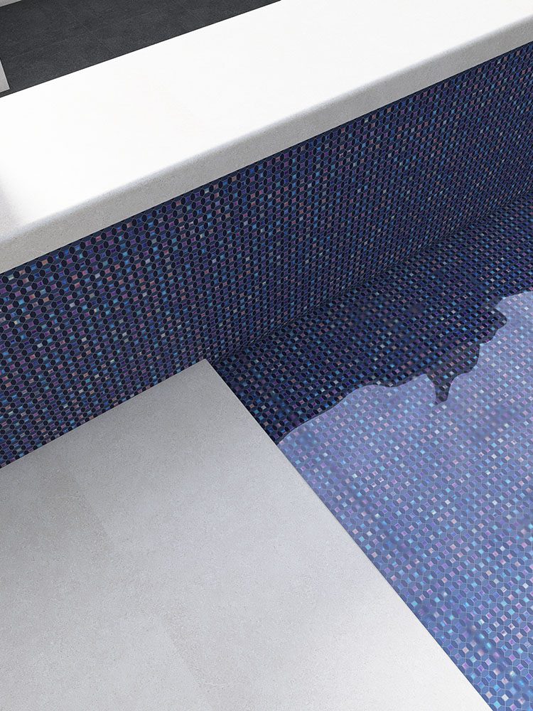 Blue iridescent glass mosaic tiles in the pool.