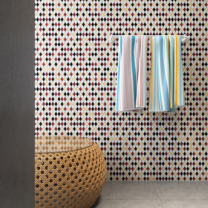Multicolored diamond-shaped glass mosaic tiles in the bathroom, creating a vibrant