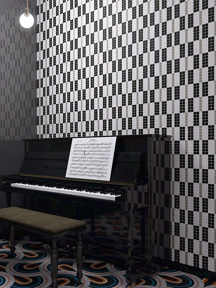 Geometric black and white mosaic tiles on the wall with a piano beside them