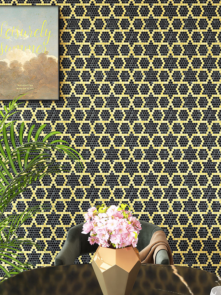 Green marble and stainless steel mosaic tiles in star and hexagon patterns.